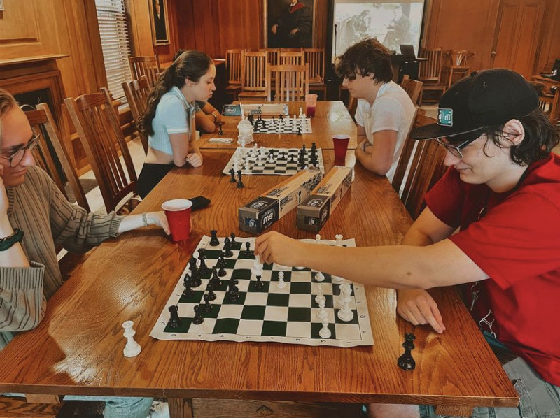 Chess Club members play together in the Presidents Lounge.